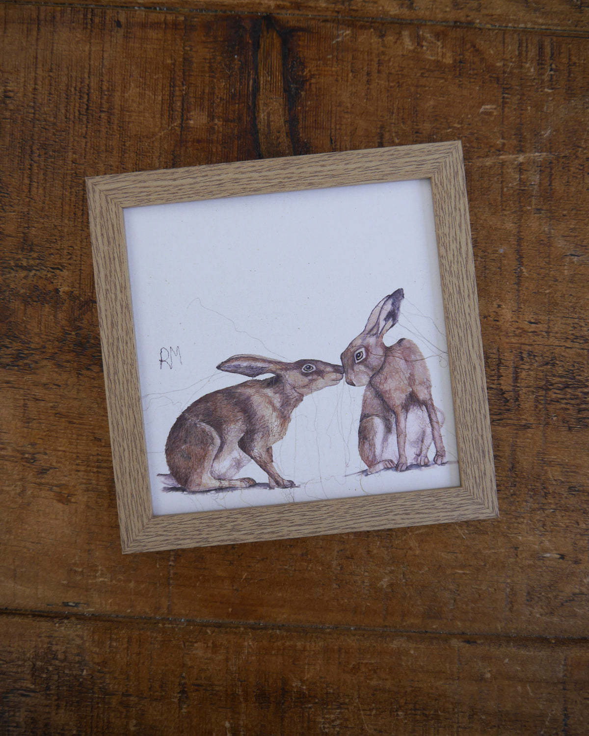Two Hares Small Framed Print
